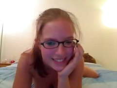 Nerd girl with ponytails riding on webcam